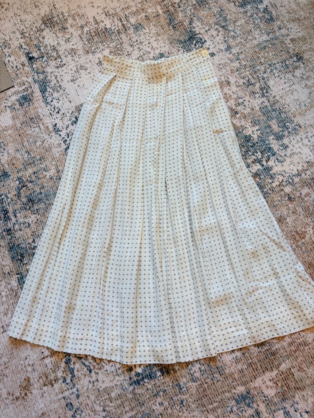 Cream Midi Pleated Skirt with Subtle Dot Print
